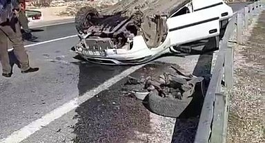 Takla atan araçtan burnu bile kanamadan kurtuldu