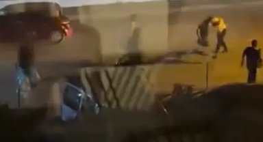 Bursa'da iki aile birbirine girdi! Cadde ortası savaş alanına döndü